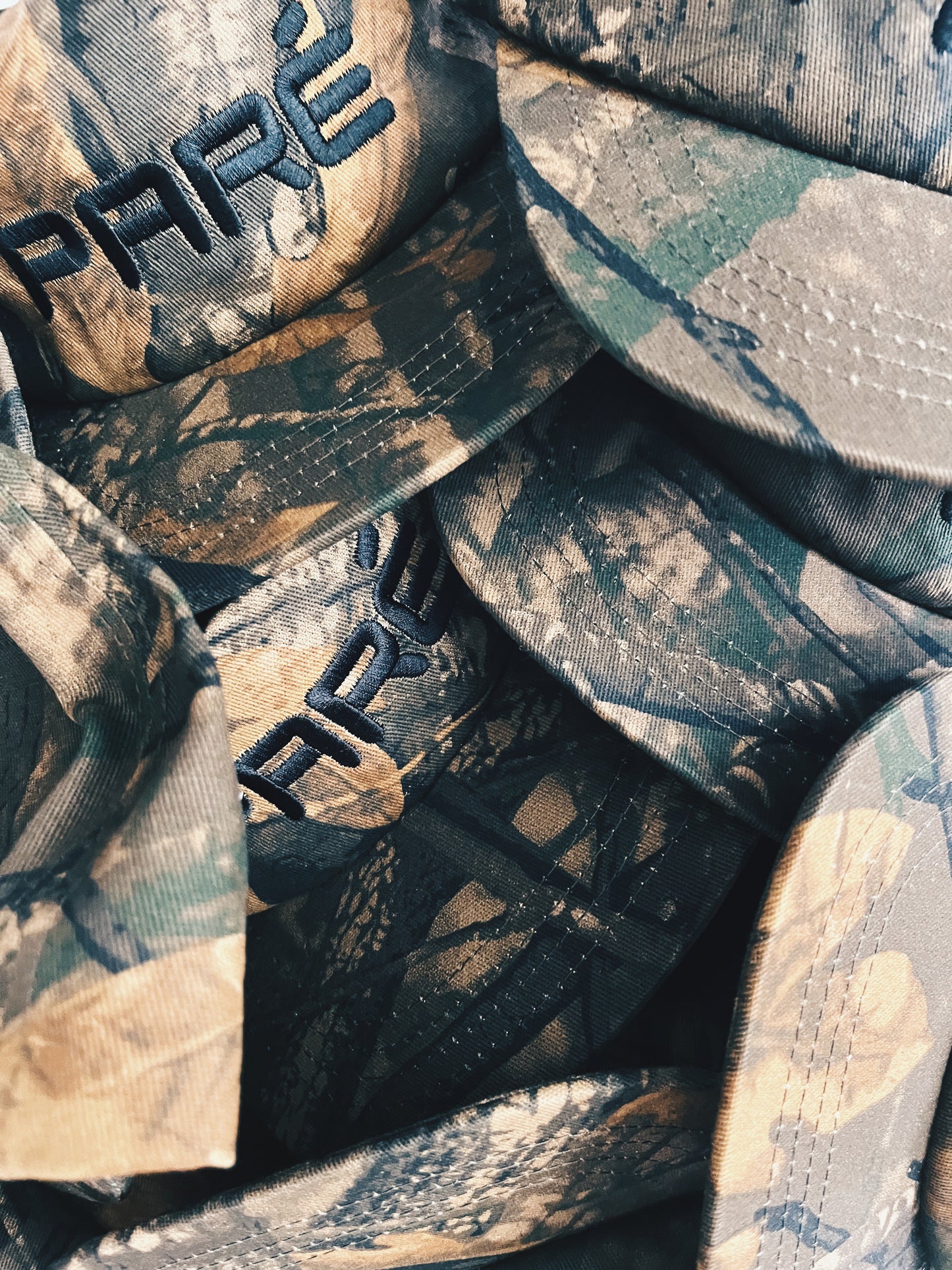 Paré Camo Snapback Hat