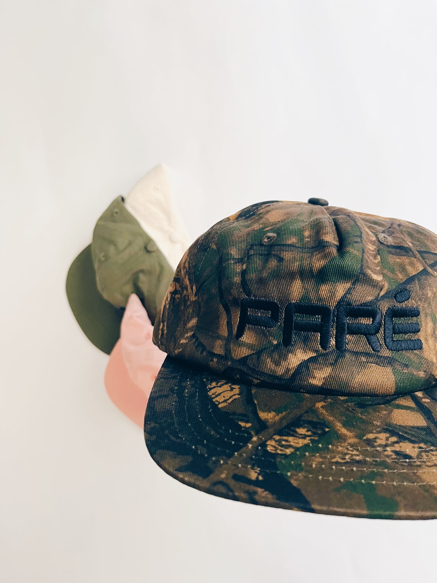 Paré Camo Snapback Hat